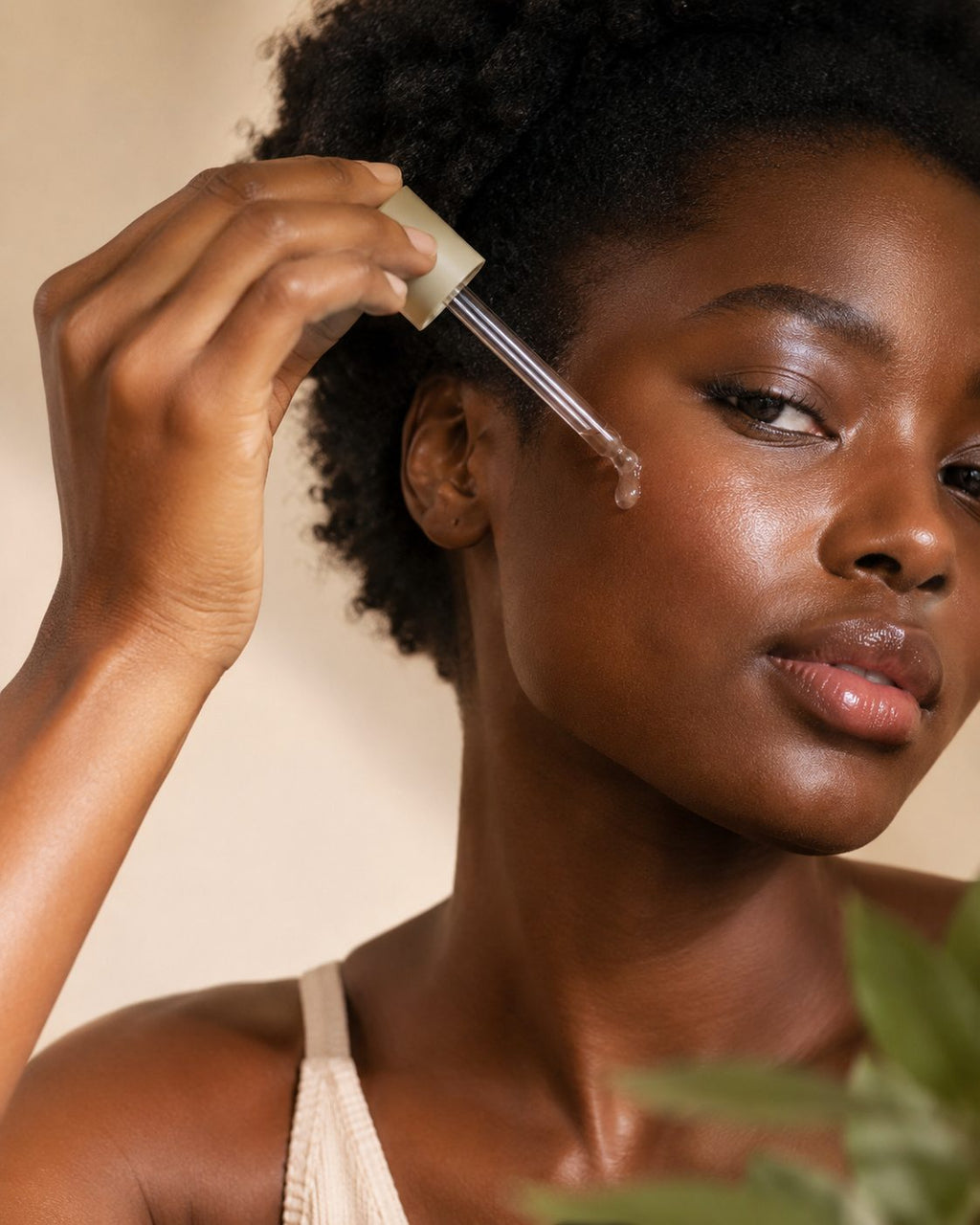 Applying a serum with a dropper — serums at Nwonane